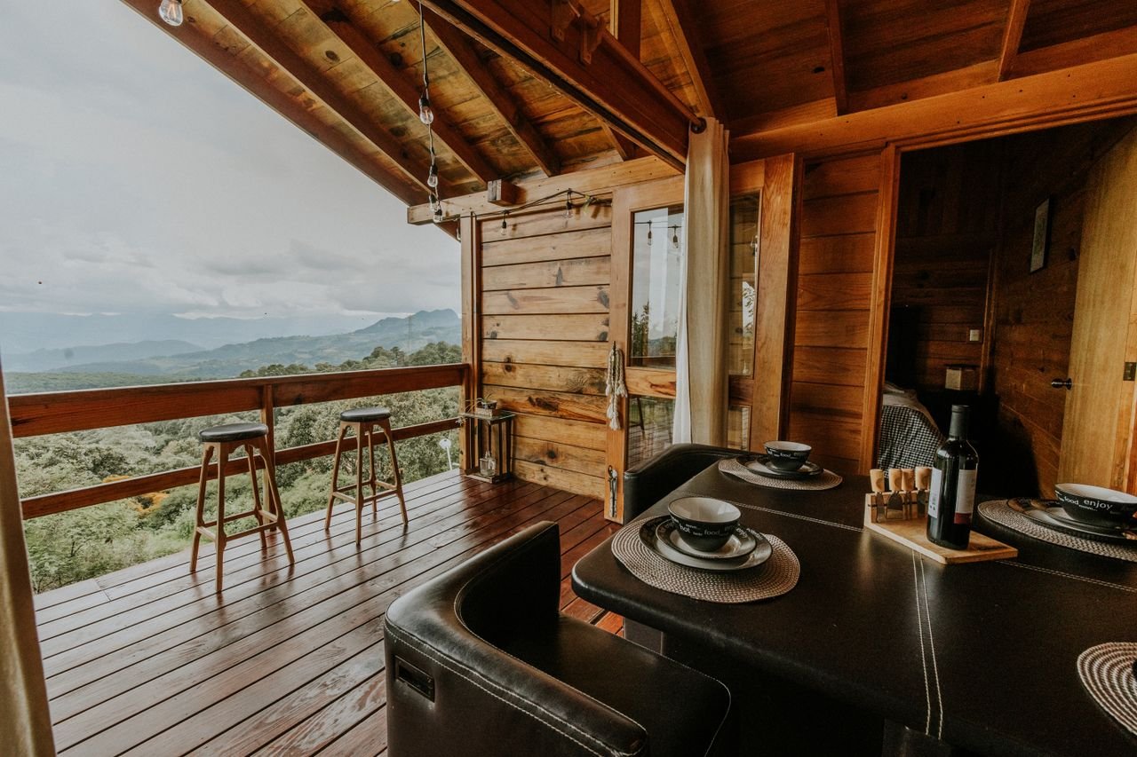 Enjoy a relaxing retreat in a wooden mountain chalet with breathtaking views.